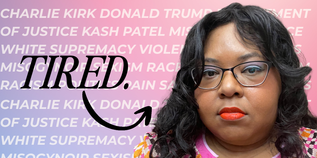 Monique looks a little tired in this picture. Words like "Charlie Kirk," "Donald Trump" and "White supremacy" are behind her.