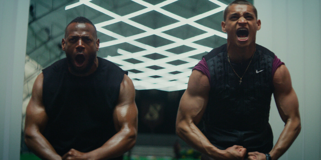 Marlon Wayans and Tyriq Withers flex and scream in HIM. (Credit: Universal Pictures)