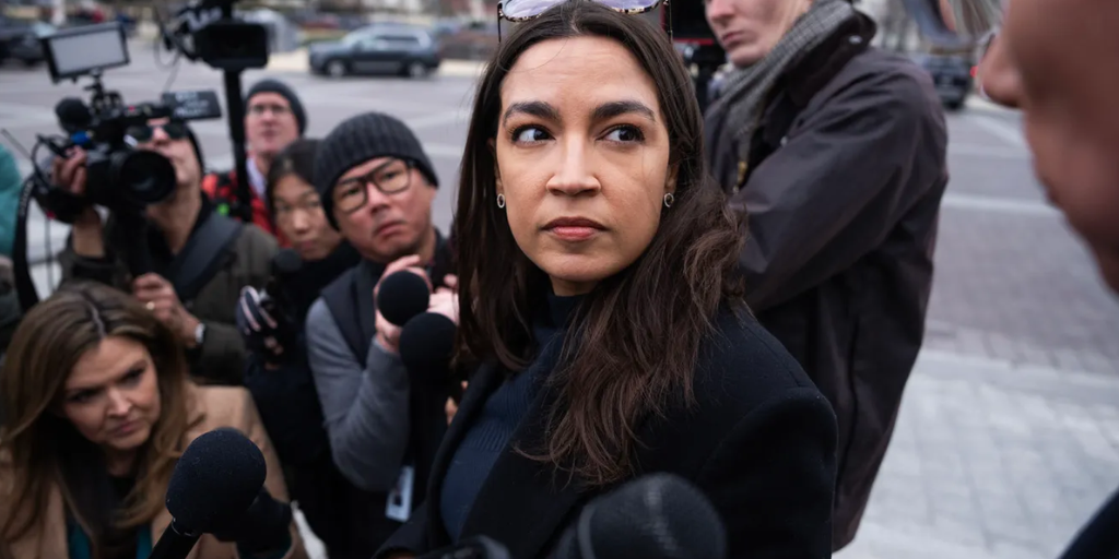 Rep. Alexandria Ocasio-Cortez talks with reporters outside the Capitol on January 9, 2026. (Tom Williams/CQ-Roll Call/Getty Images)